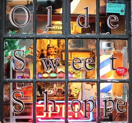 Penarth Pier, Wales, UK - January 19, 2019: Looking at the Olde sweet shoppe window display.