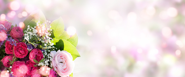 Colorful spring bouquet on soft background with bright bokeh for mothers day