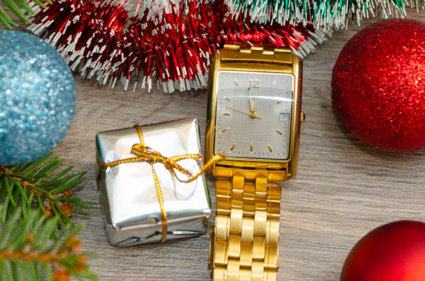 istock Christmas decoration ,  clock on wooden background 1097843956