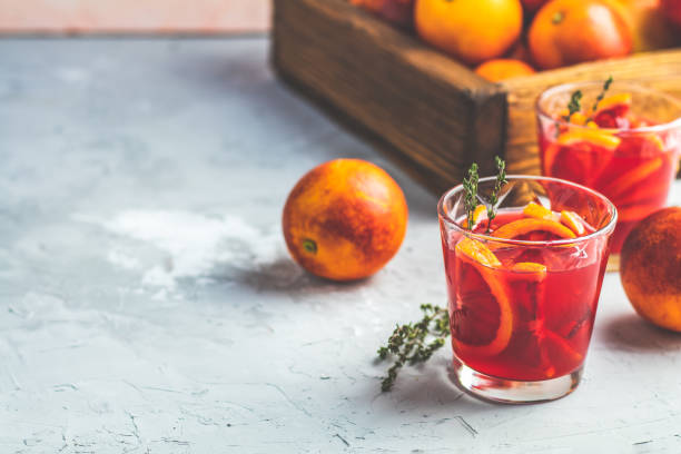 istock Campari or alcohol cocktail with Sliced Sicilian Blood oranges 1097845662