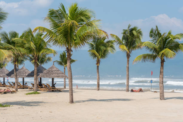 Seascape of Con Dao Island in southern Vietnam. Many wooden shacks on the beach.