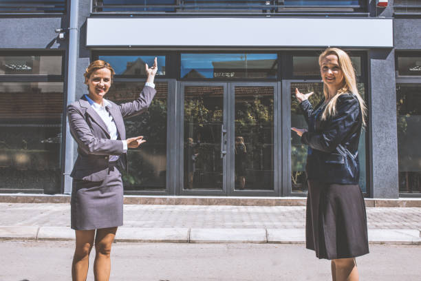 istock Pair of women working together 1097848724