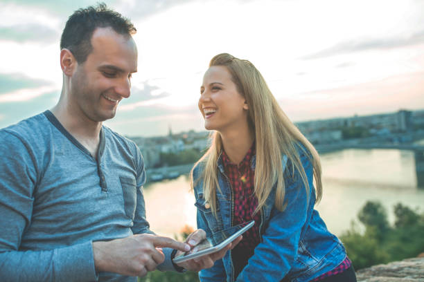 istock Happy couple use tablet, mobile phone 1097850158