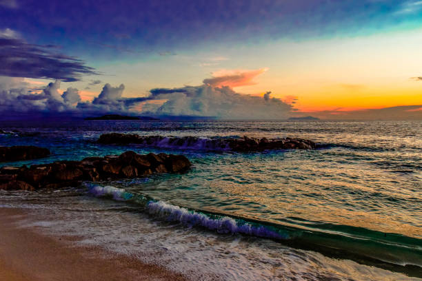 istock Coloured sunset on Seyshells island. Sea, summer, cloud, sky 1097850710