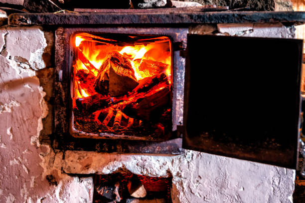 burning firewood in an old vintage oven