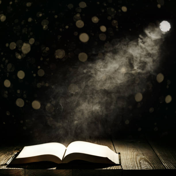 istock book against a moonlight night city 1097854852