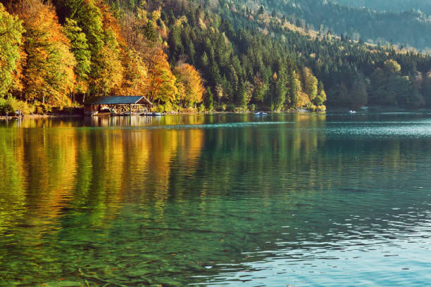 istock Beautiful blue mountain lake on a warm fall season day 1097855180