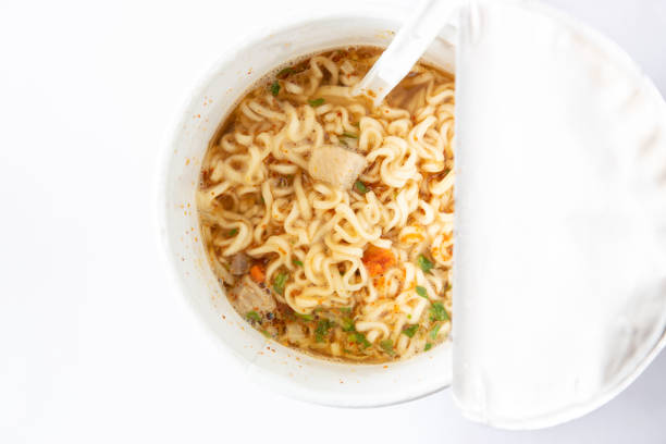 istock noodle soup in a cup view from top on white background 1097855688