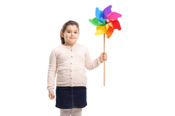 istock Little girl holding a pinwheel 1097865230