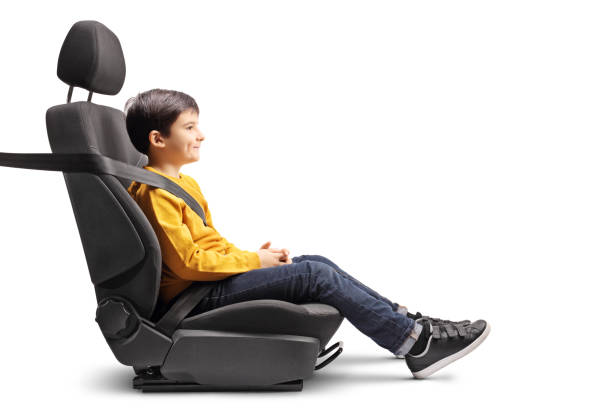 istock Little boy sitting in a car seat strapped up 1097865344