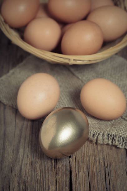 istock brown and golden chicken eggs 1097880620