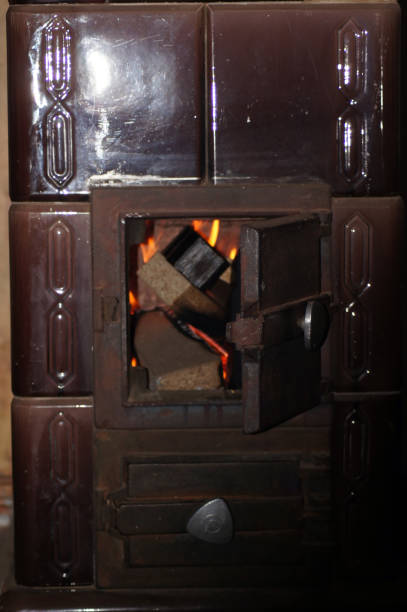 istock Old tiled stove wood coal oven 1097882764