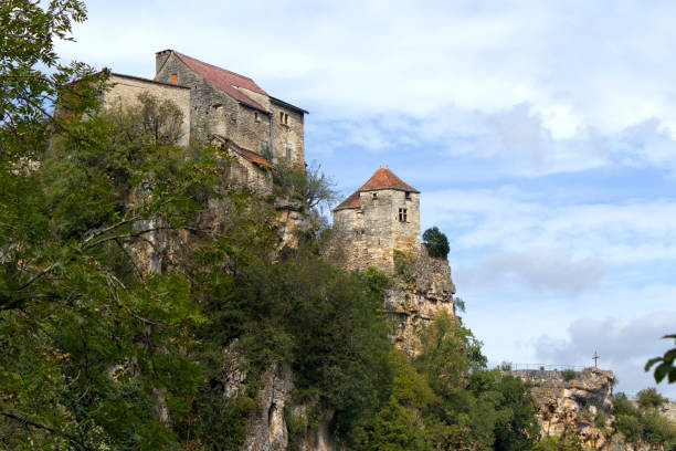 istock Buildings perched on the clifftops above the River Lot, Calvignac 1097884326