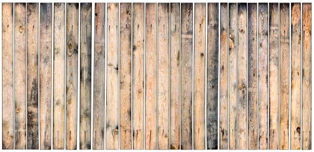 High angle view of an old weathered and cracked piece of wood isolated on white background. Useful copy space available for text and/or logo. Predominant colors are brown and white. High key DSRL studio photo taken with Canon EOS 5D Mk II and Canon EF 100mm f/2.8L Macro IS USM.