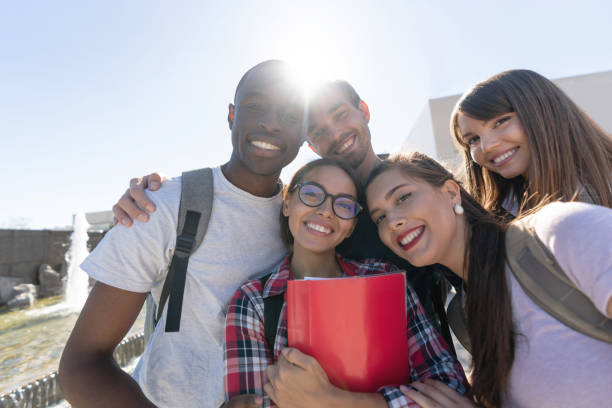 istock Happy group of students at the university 1097904524