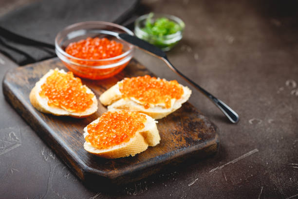 istock Delicious appetizer with red caviar. 1097904560