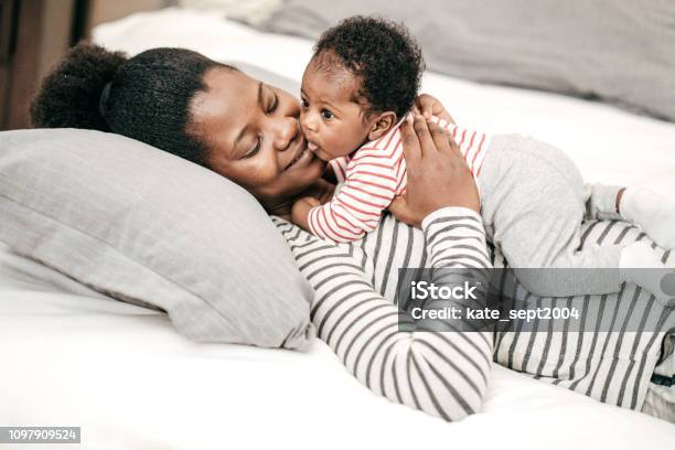 Daily Parents Activity Stock Photo - Download Image Now - Newborn, Pregnant, African-American Ethnicity