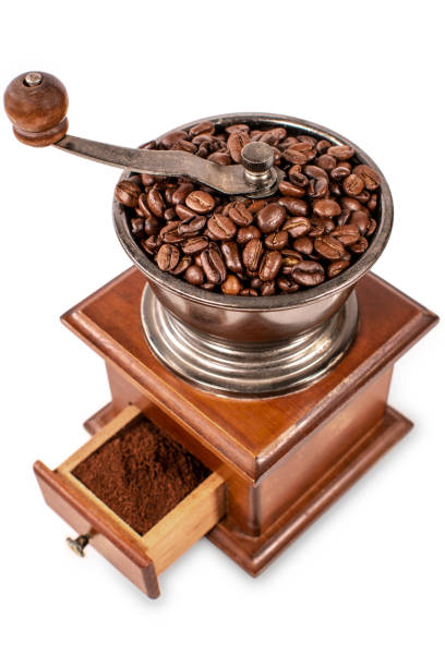 istock An old coffee grinder with whole and ground beans 1097910500
