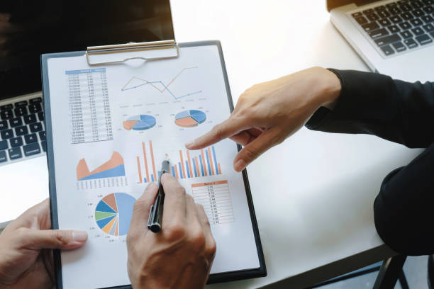 istock Business group discussing the data chart documents on the desk at the office 1097918520