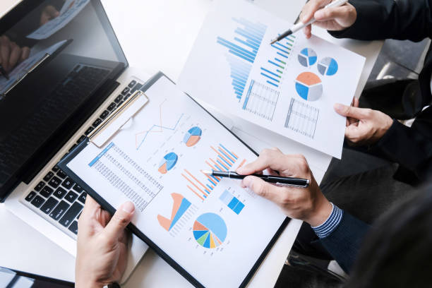 istock Business team discussing the data chart documents on the desk at the office 1097918622