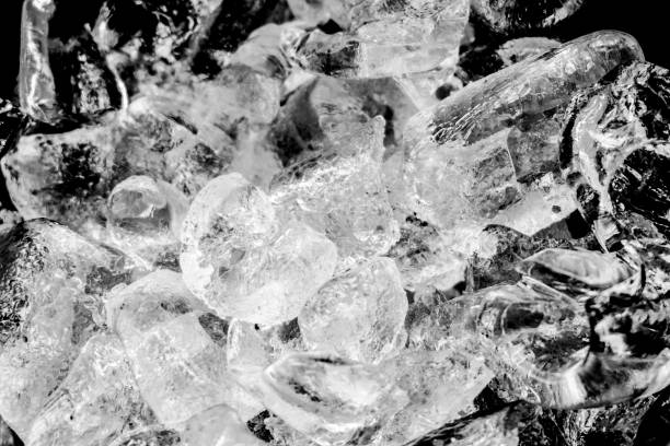 istock Pieces of crushed ice with black background 1097918624