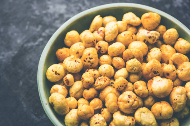 istock Roasted Phool Makhana or Crispy Lotus pops Seed served in a bowl, selective focus 1097919288