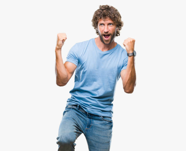 istock Handsome hispanic model man over isolated background very happy and excited doing winner gesture with arms raised, smiling and screaming for success. Celebration concept. 1097937098