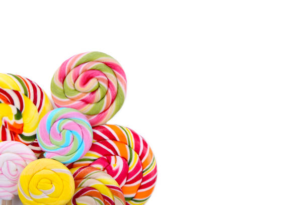istock Many colorful lollipops isolated on white background. Studio shot 1097945310