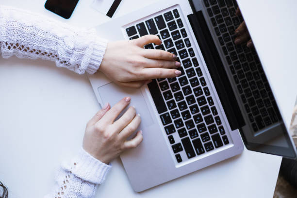 istock Girl using her laptop in her house. 1097947554