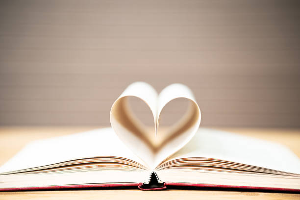 istock Pages of book curved  heart shape 1097951954