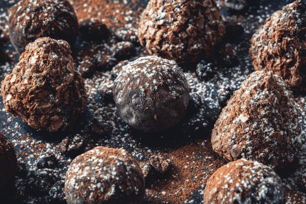 istock chocolate truffles on slate tray 1097952738
