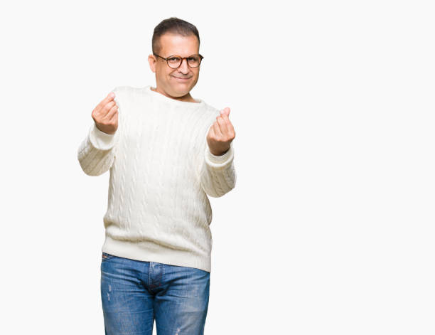 istock Middle age arab man wearing glasses over isolated background Doing money gesture with hand, asking for salary payment, millionaire business 1097954104