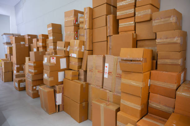 istock cardboard paper box storage in warehouse 1097954182