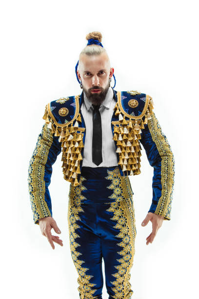istock Torero in blue and gold suit or typical spanish bullfighter isolated over white 1097955730