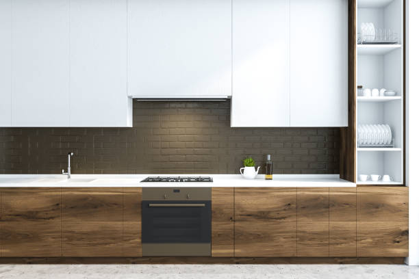 istock Black brick kitchen, wooden countertops 1097958350