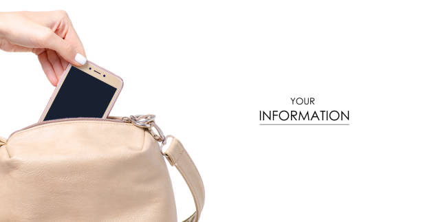 istock Female beige leather bag in hand smartphone mobile phone pattern 1097959302