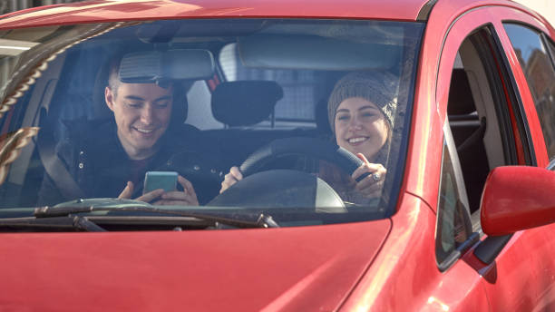 istock Millenials driving a car through the city 1097959444