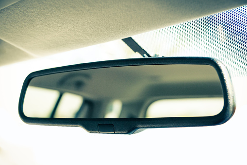 Closeup of car rear view mirror