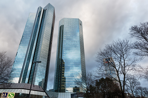 Frankfurt am Main, Germany - January 08, 2019: Deutsche Bank Twin Towers in Frankfurt. Both towers rise to 155 m and serve as headquarters for Deutsche Bank, the largest bank in Germany