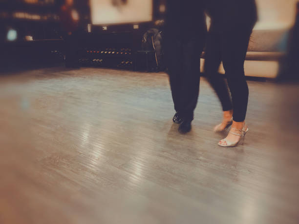 istock Tango dancing couple, legs in motion, snapshot in close 1097969976