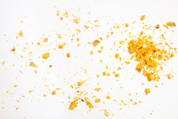 crumbs crumbs of cake on white background crumb stock pictures, royalty-free photos & images