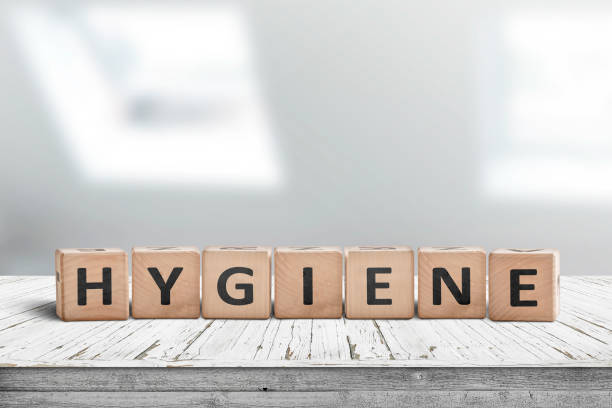 istock Hygiene sign on a wooden table in a bright bathroom 1097977958