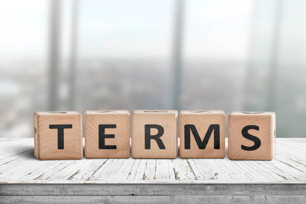 istock Terms sign in a bright office on a wooden desk 1097978128