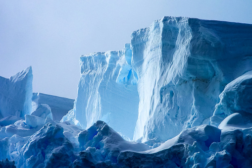 Antarctic icebergs in the waters of the ocean. Antarctic landscape Antarctic icebergs in the waters of the ocean. Antarctic landscape