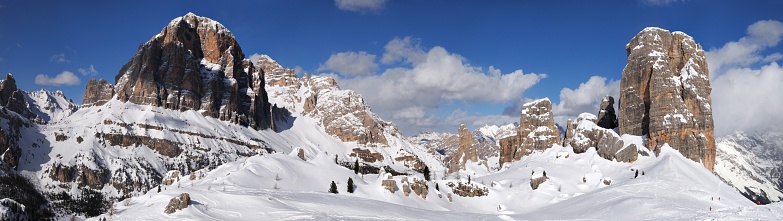Beautiful winter landscape in the Cortina d'Ampezzo Dolomites. From the left the Tofana di Rozes and to the right the Cinque Torri group. Veneto, Italy.