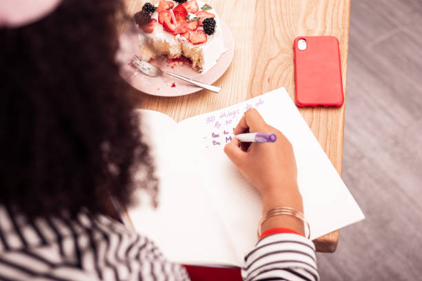 istock Top view of a to do list being written 1097992748