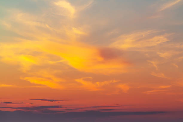 istock sky during a colorful, bright orange sunset 1097993088