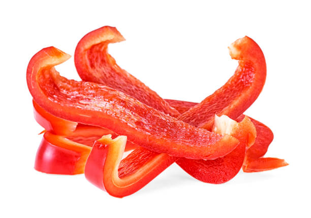 istock Red sweet bell pepper slices isolated on white background 1097998466