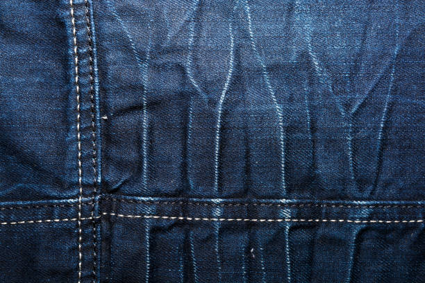 istock Shabby denim texture for background. Blue jeans 1097999344