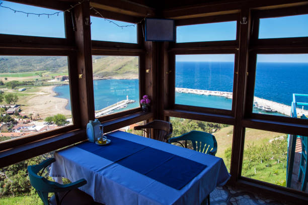 Gokceada, Turkey - April 30, 2016; Kaleköy marina view from a fish restaurant where on a hill. Gokceada Imbros, Canakkale, Turkey
